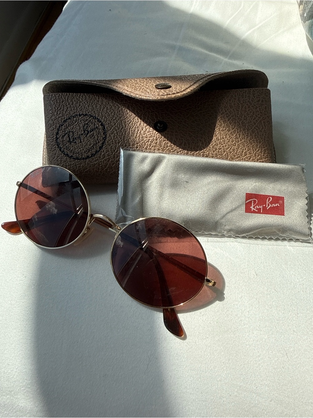 Ray-Ban Women's Round Metal Sunglasses with Brown Lenses and Gold Frame